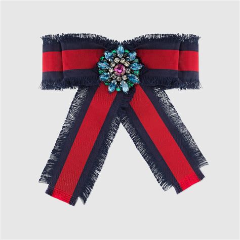 gucci ribbon brooch